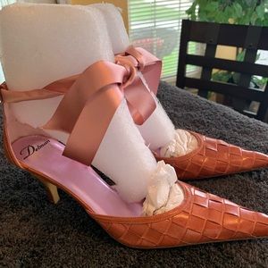 Delman lace up pumps